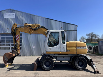 Pelle sur pneus LIEBHERR A 314 All hydr. lines SW 33- 30 Km/h: photos 4