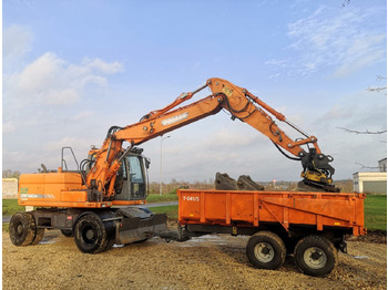 Pelle sur pneus DOOSAN DX140