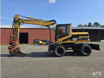 Pelle sur pneus CATERPILLAR M315