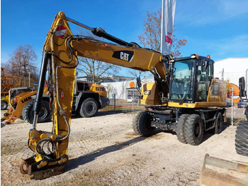 Pelle sur pneus CATERPILLAR M318F