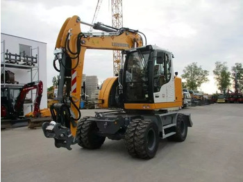 Pelle sur pneus LIEBHERR A 913