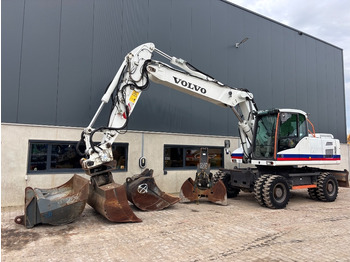 Pelle sur pneus VOLVO EW210D