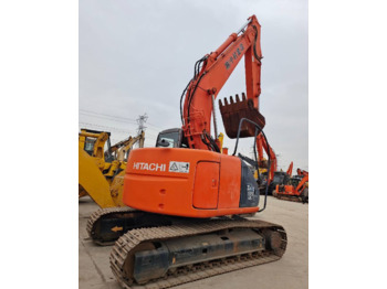 Pelle sur chenille Hitachi ZX 135: photos 1