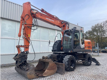 Pelle sur pneus HITACHI ZX140W-3