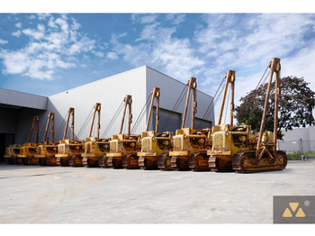 Poseur de canalisations CATERPILLAR