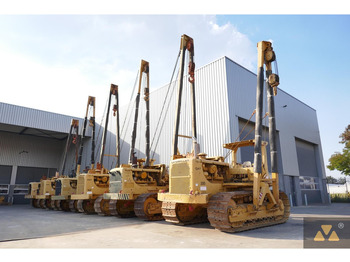 Poseur de canalisations CATERPILLAR
