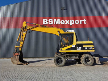 Pelle sur pneus CATERPILLAR M315
