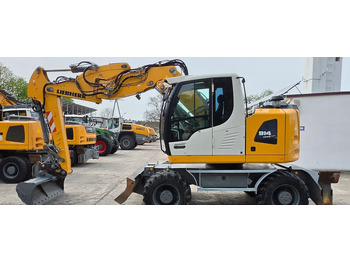 Pelle sur pneus Liebherr A 914 COMPACT: photos 3