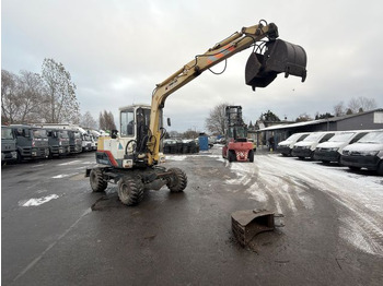 Pelle sur pneus YANMAR