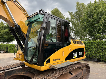 Pelle sur chenille Caterpillar 319D: photos 3