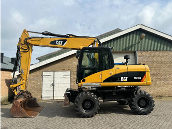 Pelle sur pneus CATERPILLAR M316D