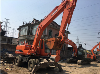 Pelle sur pneus Doosan DH210w-7 wheel excavator: photos 5 Pelle sur pneus Doosan DH210w-7 wheel excavator: photos 5