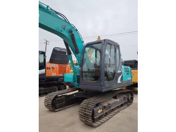 Pelle sur chenille Kobelco 130: photos 5