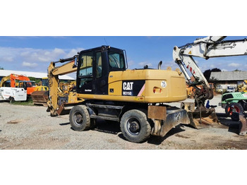Pelle sur pneus CAT M 315 D: photos 5