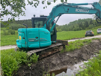 Pelle 2016 Kobelco SK75SR-3E excavator w/ 2 buckets, rototilt and factory new engine: photos 2