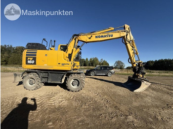 Pelle sur pneus Komatsu PW 160: photos 4