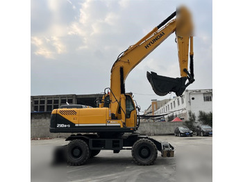 Pelle sur pneus HYUNDAI ROBEX 210W-9: photos 2 Pelle sur pneus HYUNDAI ROBEX 210W-9: photos 2