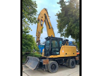 Pelle de manutention CATERPILLAR MH3022