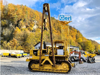 Poseur de canalisations CATERPILLAR