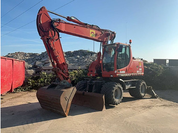 Pelle sur pneus NEW HOLLAND