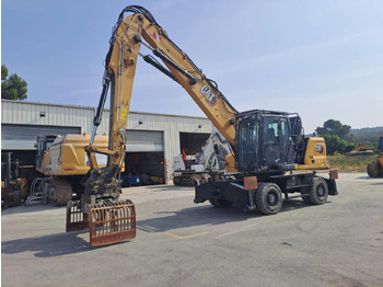 Pelle sur pneus CATERPILLAR MH3024
