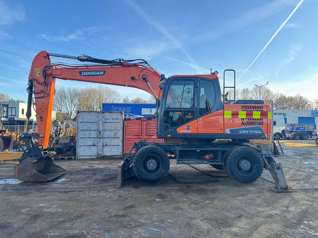 Doosan DX 170 W - 5 - Pelle sur pneus: photos 1 Doosan DX 170 W - 5 - Pelle sur pneus: photos 1
