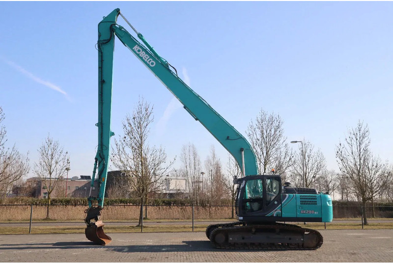 Kobelco SK260 NLC -10E | 18.5 METER LONG REACH | TILT BUCKET - Pelle sur chenille: photos 1 Kobelco SK260 NLC -10E | 18.5 METER LONG REACH | TILT BUCKET - Pelle sur chenille: photos 1
