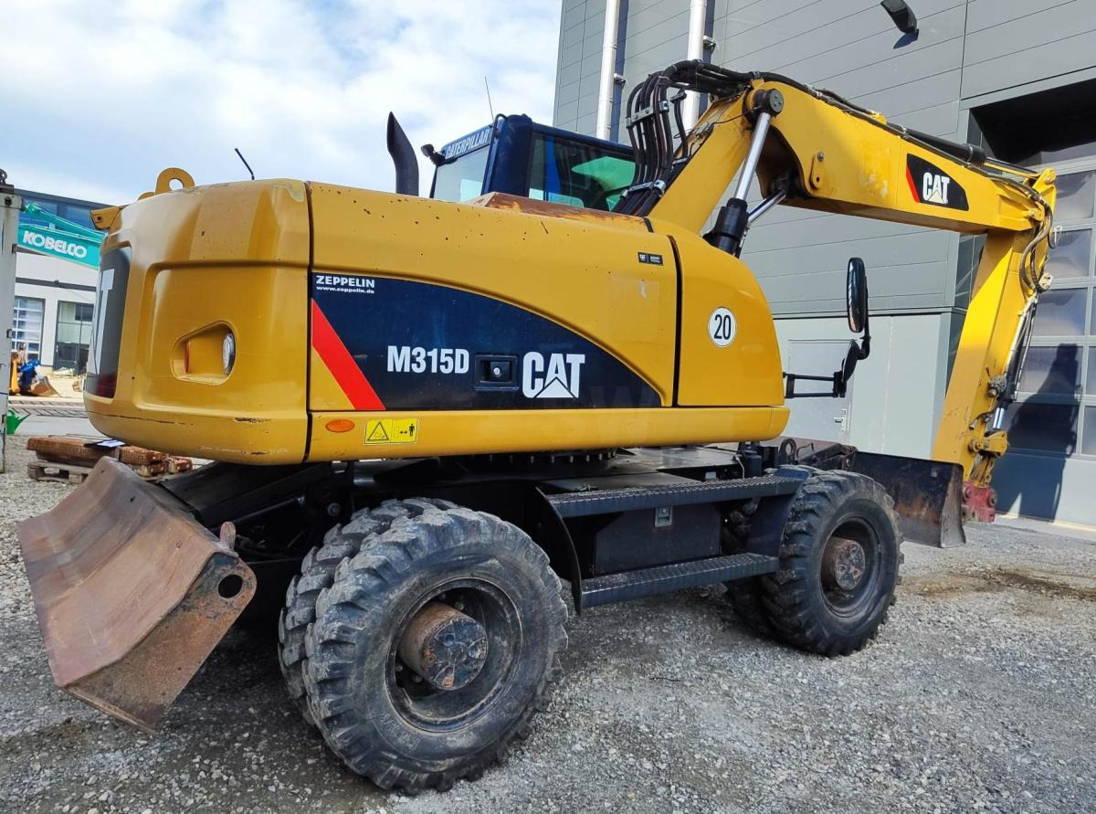 Caterpillar M315D - Pelle sur pneus: photos 4 Caterpillar M315D - Pelle sur pneus: photos 4