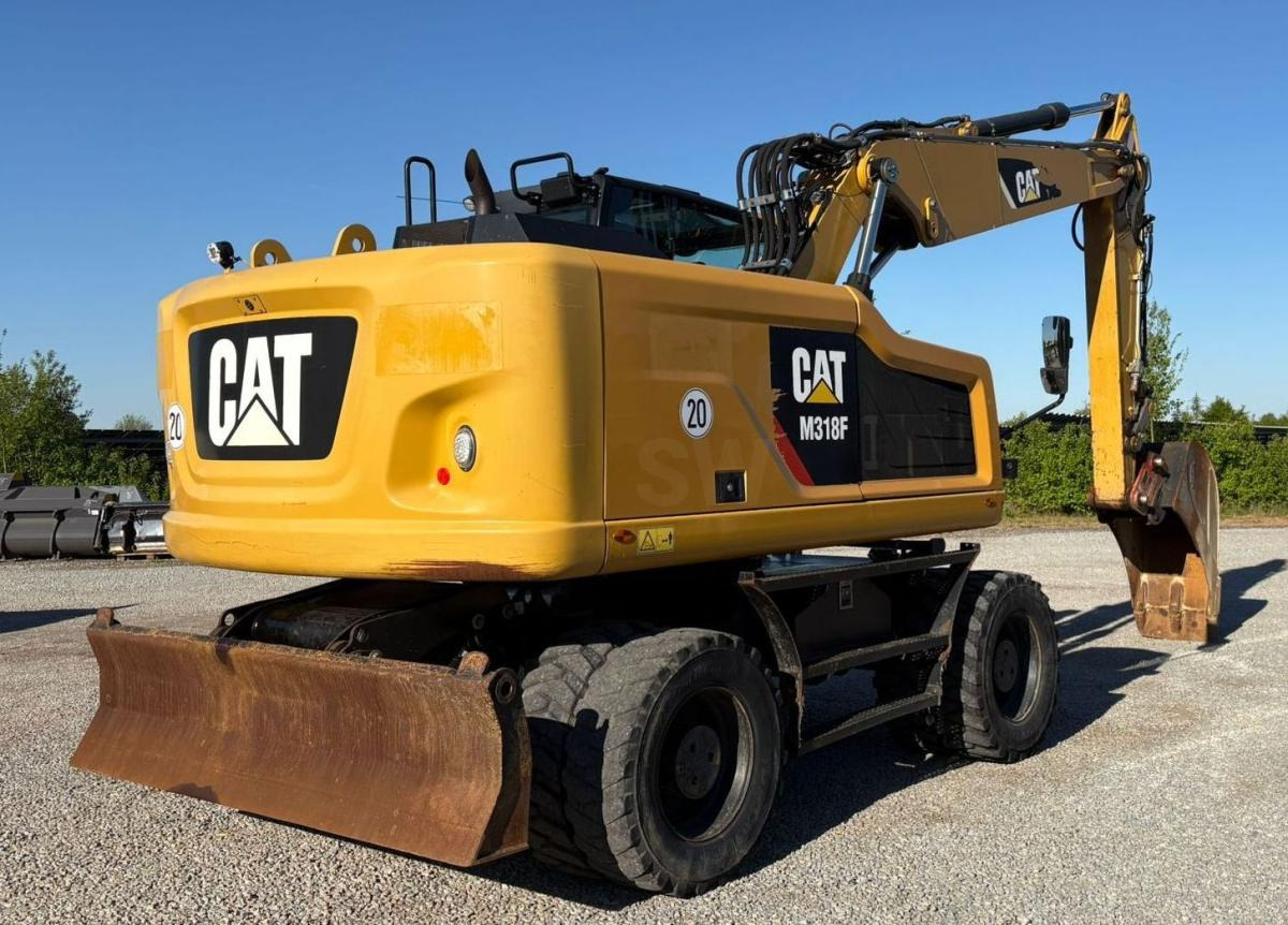 Caterpillar M318F - Pelle sur pneus: photos 4 Caterpillar M318F - Pelle sur pneus: photos 4