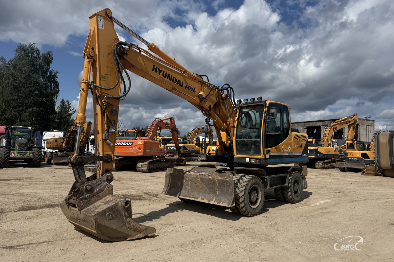 Hyundai Robex - Pelle sur pneus: photos 1 Hyundai Robex - Pelle sur pneus: photos 1