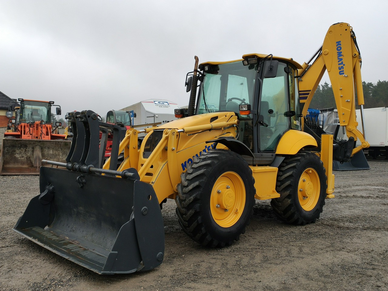 Komatsu WB 93S-5E0 Bez Luzów Zadbana Sprawna Super Stan !!! - Tractopelle: photos 1 Komatsu WB 93S-5E0 Bez Luzów Zadbana Sprawna Super Stan !!! - Tractopelle: photos 1