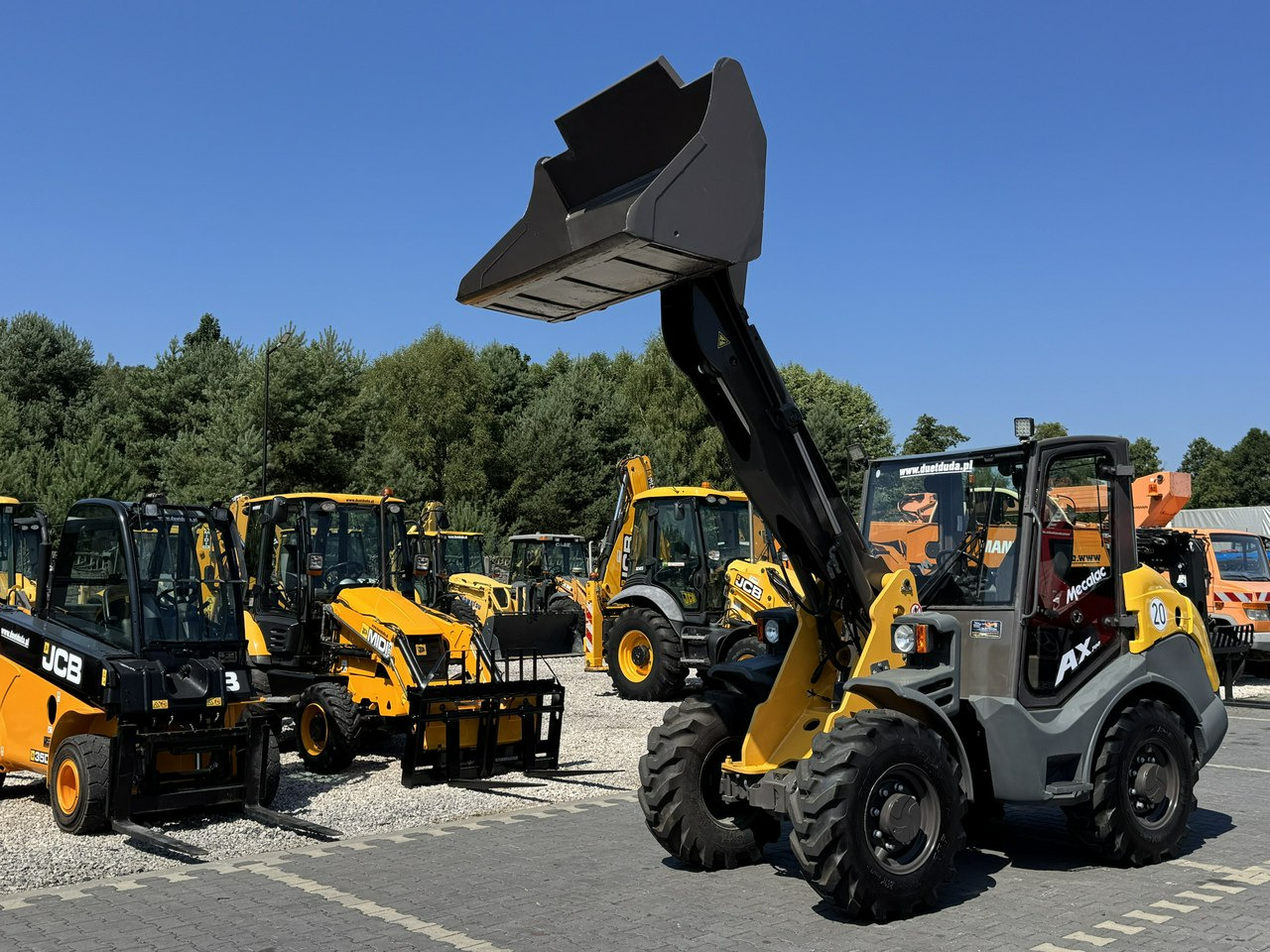 Mecalac AX 700 Szybko-Złącze Łyżka Super Stan - Chargeuse sur pneus: photos 1 Mecalac AX 700 Szybko-Złącze Łyżka Super Stan - Chargeuse sur pneus: photos 1