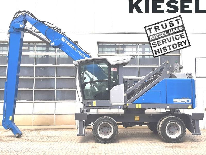Fuchs MHL 320 F - Pelle de manutention: photos 1 Fuchs MHL 320 F - Pelle de manutention: photos 1