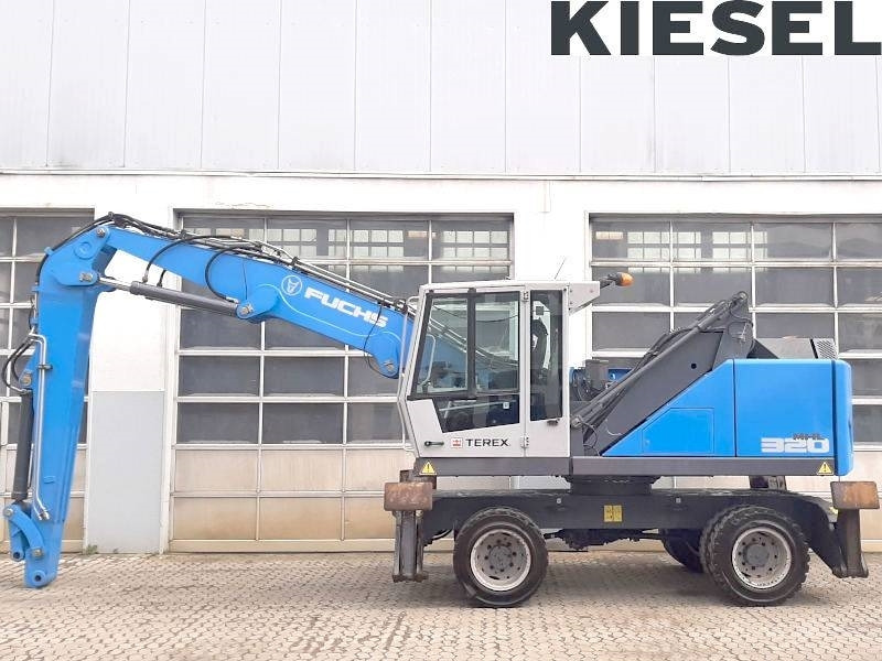 Fuchs MHL 320 F - Pelle de manutention: photos 1 Fuchs MHL 320 F - Pelle de manutention: photos 1