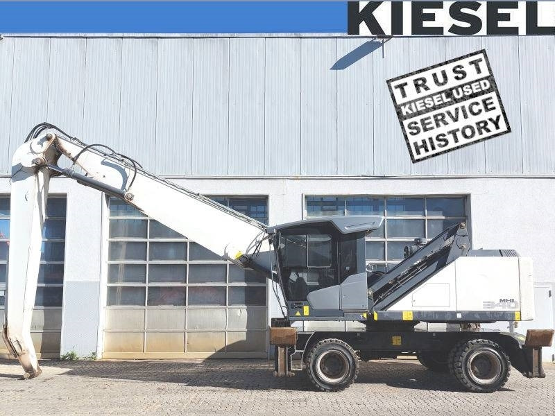 Fuchs MHL 340 F - Pelle de manutention: photos 1 Fuchs MHL 340 F - Pelle de manutention: photos 1