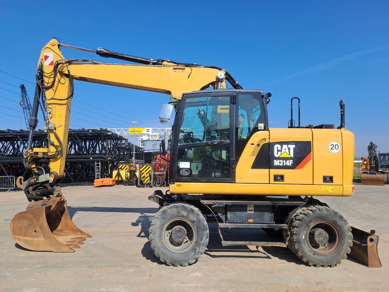 Cat M314F - Pelle sur pneus: photos 1 Cat M314F - Pelle sur pneus: photos 1