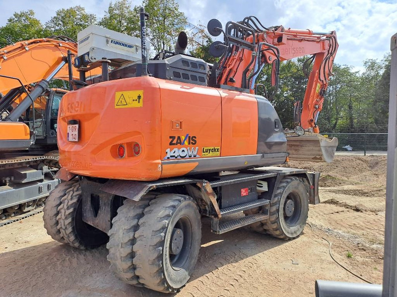 Hitachi ZX140WTB-6 - Pelle sur pneus: photos 4 Hitachi ZX140WTB-6 - Pelle sur pneus: photos 4