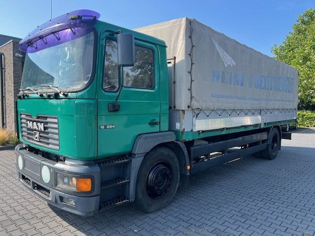 MAN 18.284 - Camion à rideaux coulissants: photos 1 MAN 18.284 - Camion à rideaux coulissants: photos 1