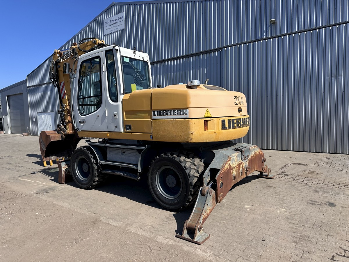 Pelle sur pneus LIEBHERR A 314 All hydr. lines SW 33- 30 Km/h: photos 8