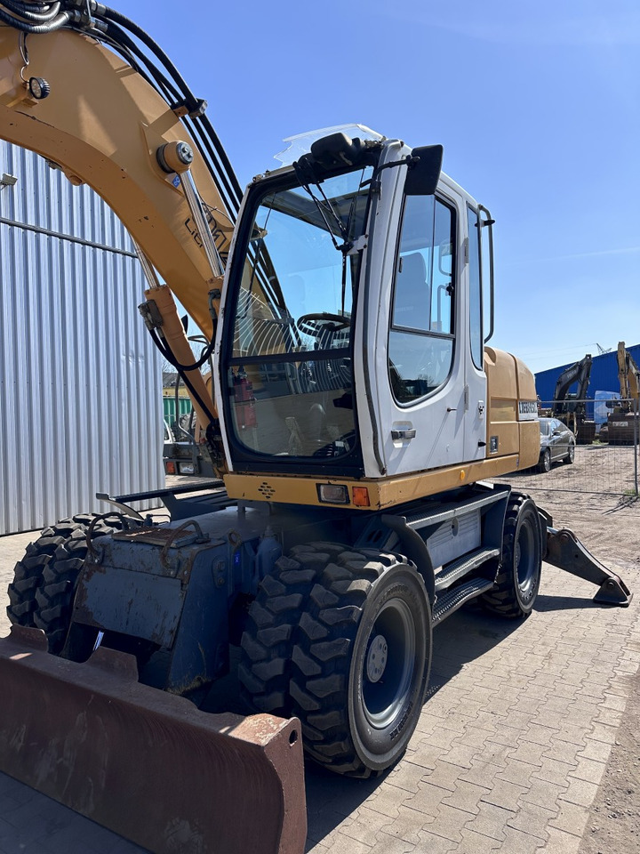 Pelle sur pneus LIEBHERR A 314 All hydr. lines SW 33- 30 Km/h: photos 17