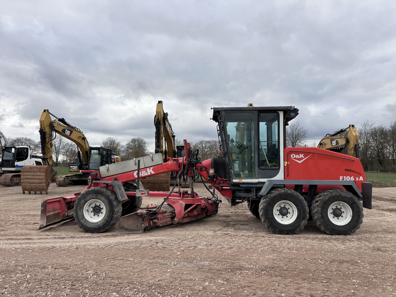 NEW HOLLAND F 106.5 - 6x6 Laser Topcon- Klima Cummins 6 Zyl. - Niveleuse: photos 1 NEW HOLLAND F 106.5 - 6x6 Laser Topcon- Klima Cummins 6 Zyl. - Niveleuse: photos 1