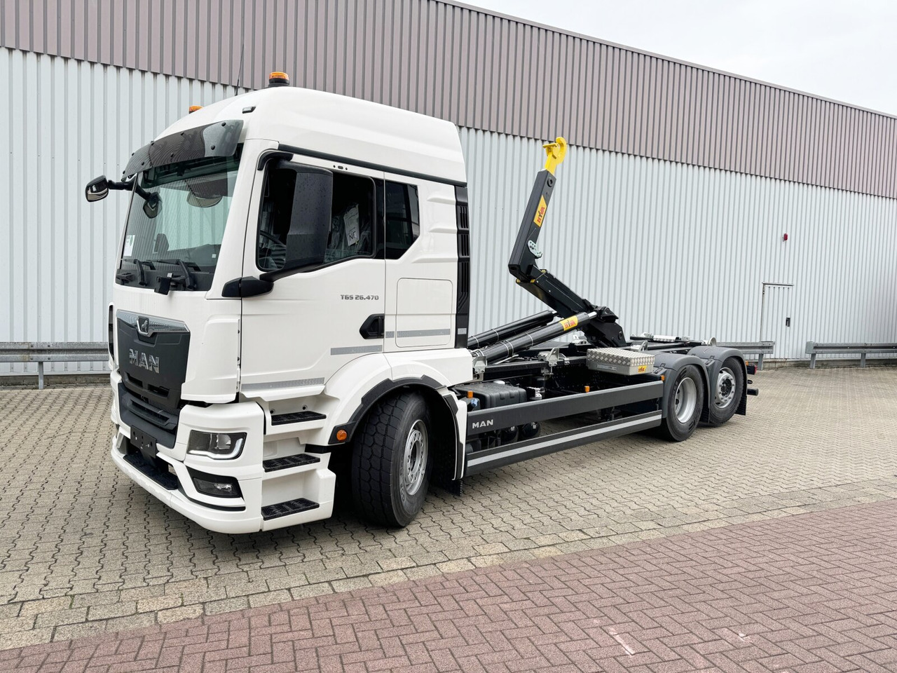 MAN TGS 26.470 6x2-4 LL CH TGS 26.470 6x2-4 LL CH, Retarder, Navi, Lenk-/Liftachse - Camion ampliroll: photos 1 MAN TGS 26.470 6x2-4 LL CH TGS 26.470 6x2-4 LL CH, Retarder, Navi, Lenk-/Liftachse - Camion ampliroll: photos 1