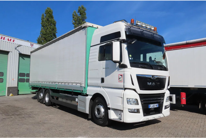 MAN TGX 26.470 ' AS NEW' condition, lift axel, moving axel, edscha, video back, etc, etc, etc - Camion à rideaux coulissants: photos 1 MAN TGX 26.470 ' AS NEW' condition, lift axel, moving axel, edscha, video back, etc, etc, etc - Camion à rideaux coulissants: photos 1