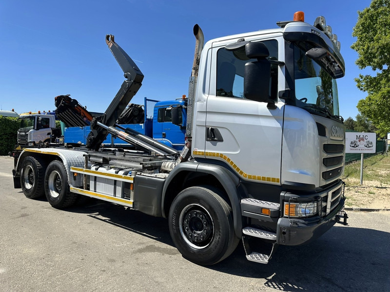 Scania G450 6x4 HAAKSYSTEEM AJK 20T - 5760mm - 3m90 WB - BLADVERING / NAAFREDUCTIE - EURO 6 - BE TRUCK - Camion ampliroll: photos 1 Scania G450 6x4 HAAKSYSTEEM AJK 20T - 5760mm - 3m90 WB - BLADVERING / NAAFREDUCTIE - EURO 6 - BE TRUCK - Camion ampliroll: photos 1