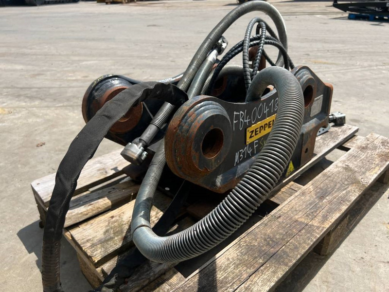 OilQuick OQ65 - M314F / M316F / M318F - Attache rapide pour Engins de chantier: photos 5 OilQuick OQ65 - M314F / M316F / M318F - Attache rapide pour Engins de chantier: photos 5