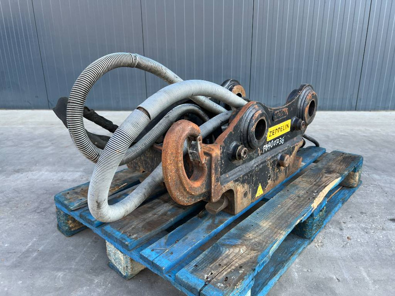 OilQuick OQ65 - M314F / M316F / M318F - Attache rapide pour Engins de chantier: photos 1 OilQuick OQ65 - M314F / M316F / M318F - Attache rapide pour Engins de chantier: photos 1