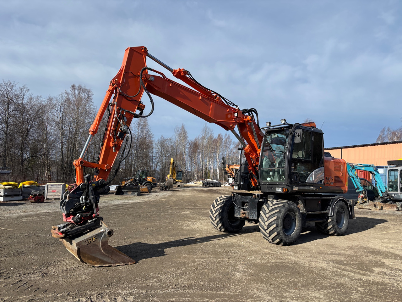 Hitachi ZX140W-5B - Pelle: photos 1 Hitachi ZX140W-5B - Pelle: photos 1