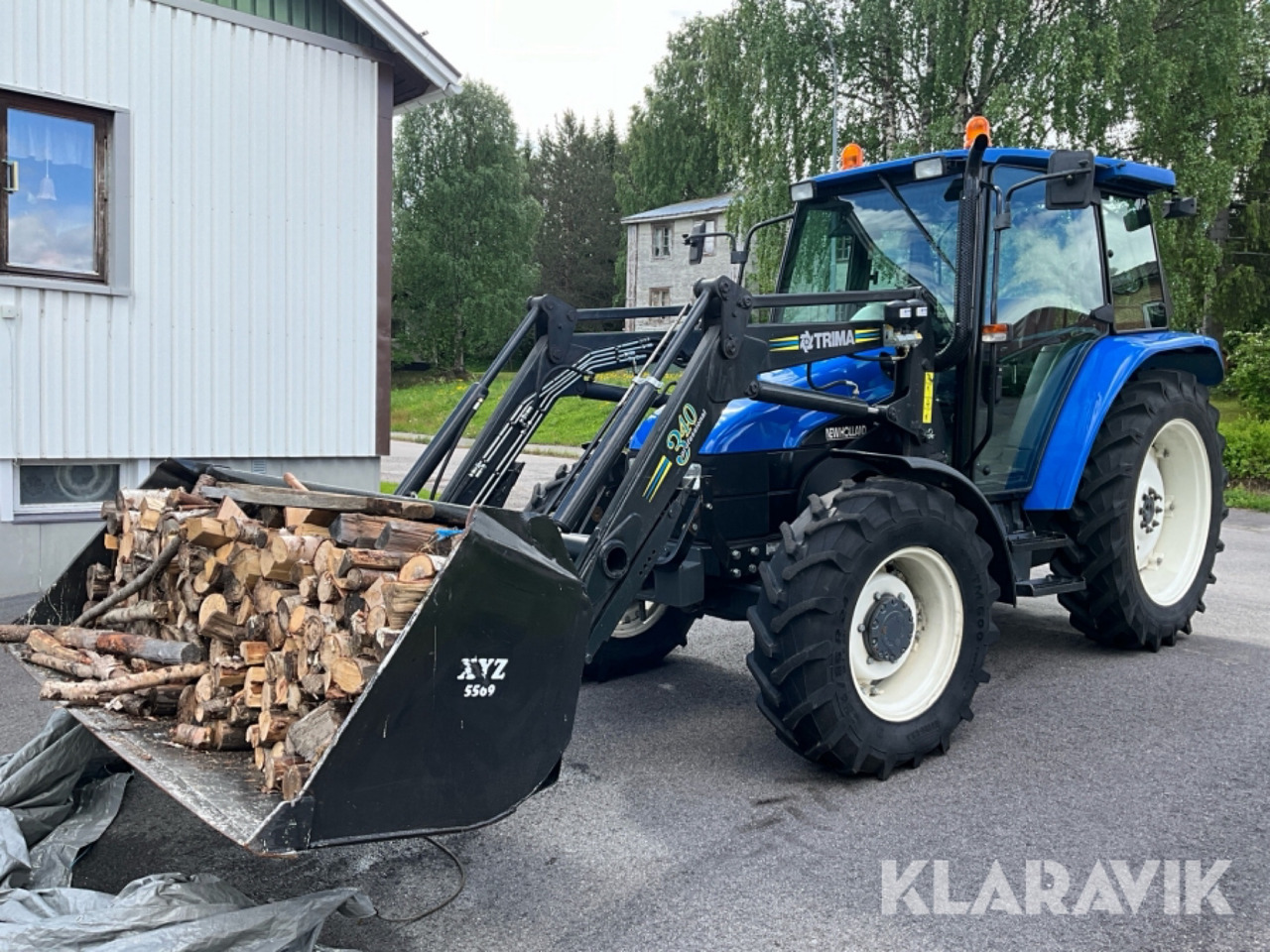 New Holland TL 70 - Tracteur agricole: photos 1 New Holland TL 70 - Tracteur agricole: photos 1