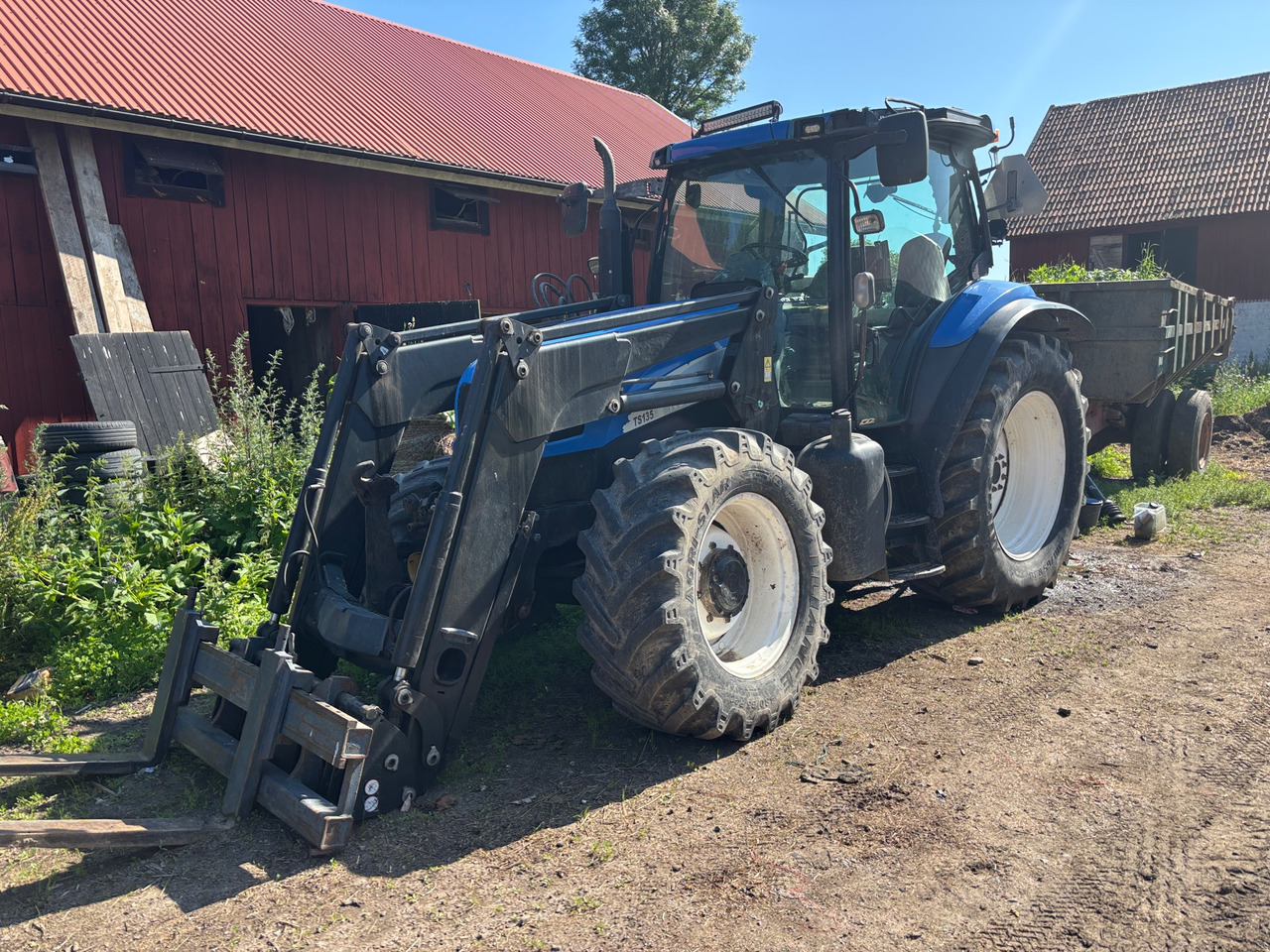 New Holland TS135A - Tracteur agricole: photos 1 New Holland TS135A - Tracteur agricole: photos 1