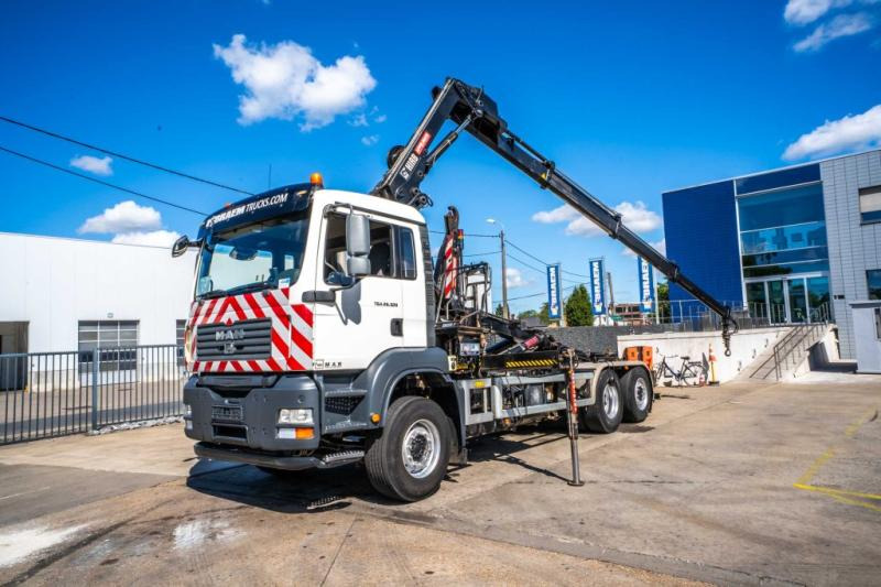 MAN TGA 26.320 BL -6X2-4+HIAB 122 E3 HIDUO - Camion ampliroll, Camion grue: photos 1 MAN TGA 26.320 BL -6X2-4+HIAB 122 E3 HIDUO - Camion ampliroll, Camion grue: photos 1